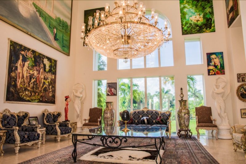 estate-grand-salon Two-story grand salon with monumental crystal chandelier and fine art